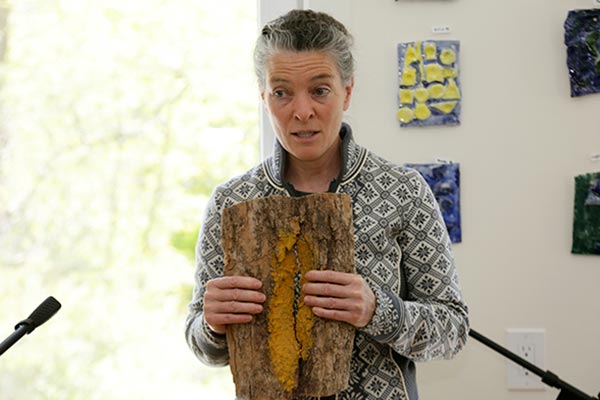 Patty Rudge shows a forest marker